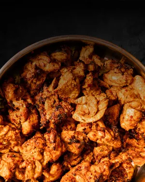 Angara chicken tikka piece: Hot & fiery